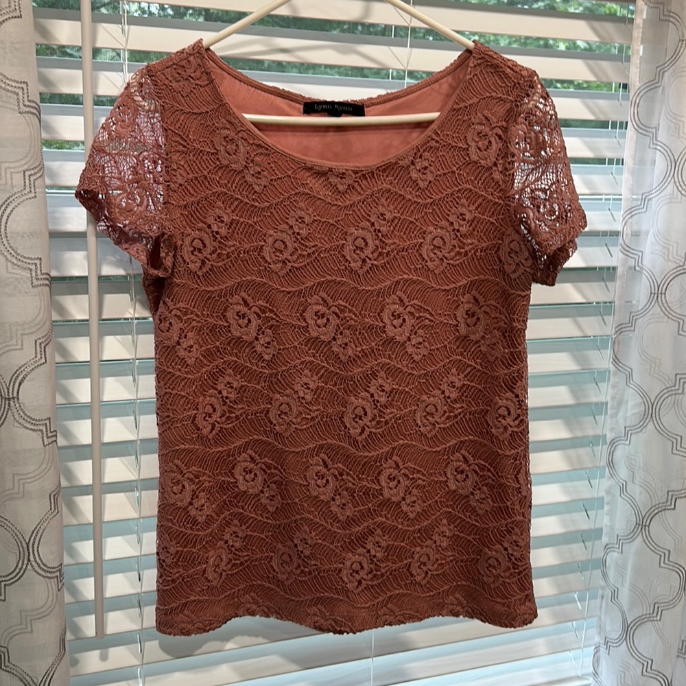 A pink beautiful shirt.